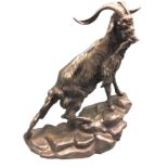 Mené, animalié bronze, study of a goat perched on rocks holding sprig in mouth, signed. (9in)