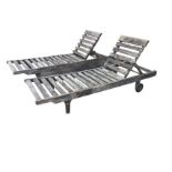 A pair of Bridgman rectangular iroco garden loungers with slatted bases, having hinged backrests,
