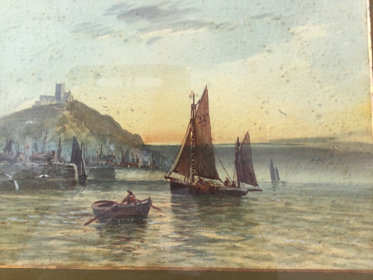 Anderson, C19th watercolour, estuary scene with boats and harbour below church, possibly Whitby,