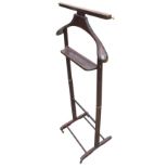 An Italian Brevettato gentlemans coatstand with trouser rail and hanger above a tray, raised on