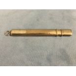 A 9ct gold cased joiners pencil of flattened rectangular form, mounted with ring to end - 5g. (3.