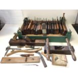 A collection of 25 moulding planes - some named; and miscellaneous other planes, tools, a file,