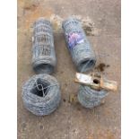 Two 50 metre rolls of galvanised fencing; and two rolls of barbed wire. (4)