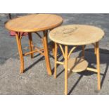 A Lloyd Lloom circular table with angled turned legs joined by hooped rails, having round platform