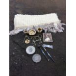 Miscellaneous items including a feathered tasseled textile throw, enamelled brassware, horse bits,