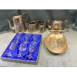 An Edwardian four-piece silver plated teaset with engraved decoration; a boxed set of six Royal