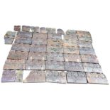 A quantity of 12in rectangular salt glazed garden edging tiles, each moulded with quatrefoil