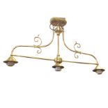 A hanging brass light with moulded ceiling plate supporting a tubular scrolled frame with three