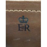 A pair of leather cases with ER royal monograms, purchased in America with provenance to the