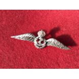 A cased RAF Fleet Air Arm sweetheart brooch set with zircons to wings, having hinged pin to