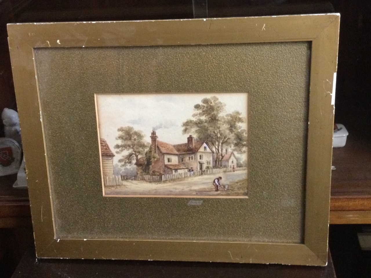 Victorian watercolour, village street scene with figures, signed with pencil monogram, label to - Image 3 of 3