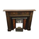 An 1950s oak chimneypiece with rectangular mantelpiece above bead panelled frieze and jambs,