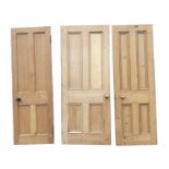 Three Victorian pine doors, each with four moulded panels and brass handles with mortice locks. (