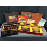 A boxed Hornby O gauge M1 goods train set with track, engine & tender, buffers, two wagons, etc; and