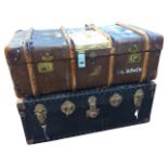 A school trunk with wood slats having brass & leather mounts; and another rectangular trunk in