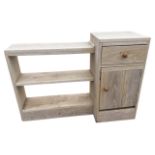 An oak shelf unit with shelves beside a cabinet with a drawer above a cupboard. (38.75in x 12.5in