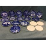 A set of fourteen Royal Copenhagen commemorative Christmas plates from 1970-1983; a similar blue