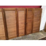 Four pairs of pine two-fold louvre-style shutter doors with brass hinges - 27in x 41.2in each door