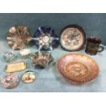 A collection of carnival glass - a graduated pair of bowls, a tankard, a rippled bowl, vine