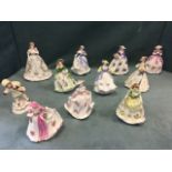 A collection of Royal Worcester figurines including December Child and Summers Day modelled by
