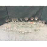 Miscellaneous sets of drinking glasses including engraved, sherry glasses, wine glasses, cocktail