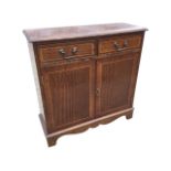 A reproduction mahogany side cabinet decorated with crossbanding and boxwood stringing, the
