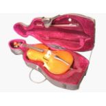 A cased Gear4Music student cello, the three-quarter size instrument complete with bow, and some