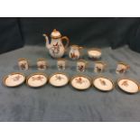 A Royal Worcester coffee set with six cups & saucers, coffeepot & cover, sucrié and cream,
