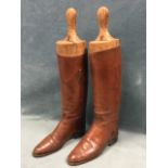 A pair of Army & Navy, tan leather riding boots with wood trees - Size 5/6.