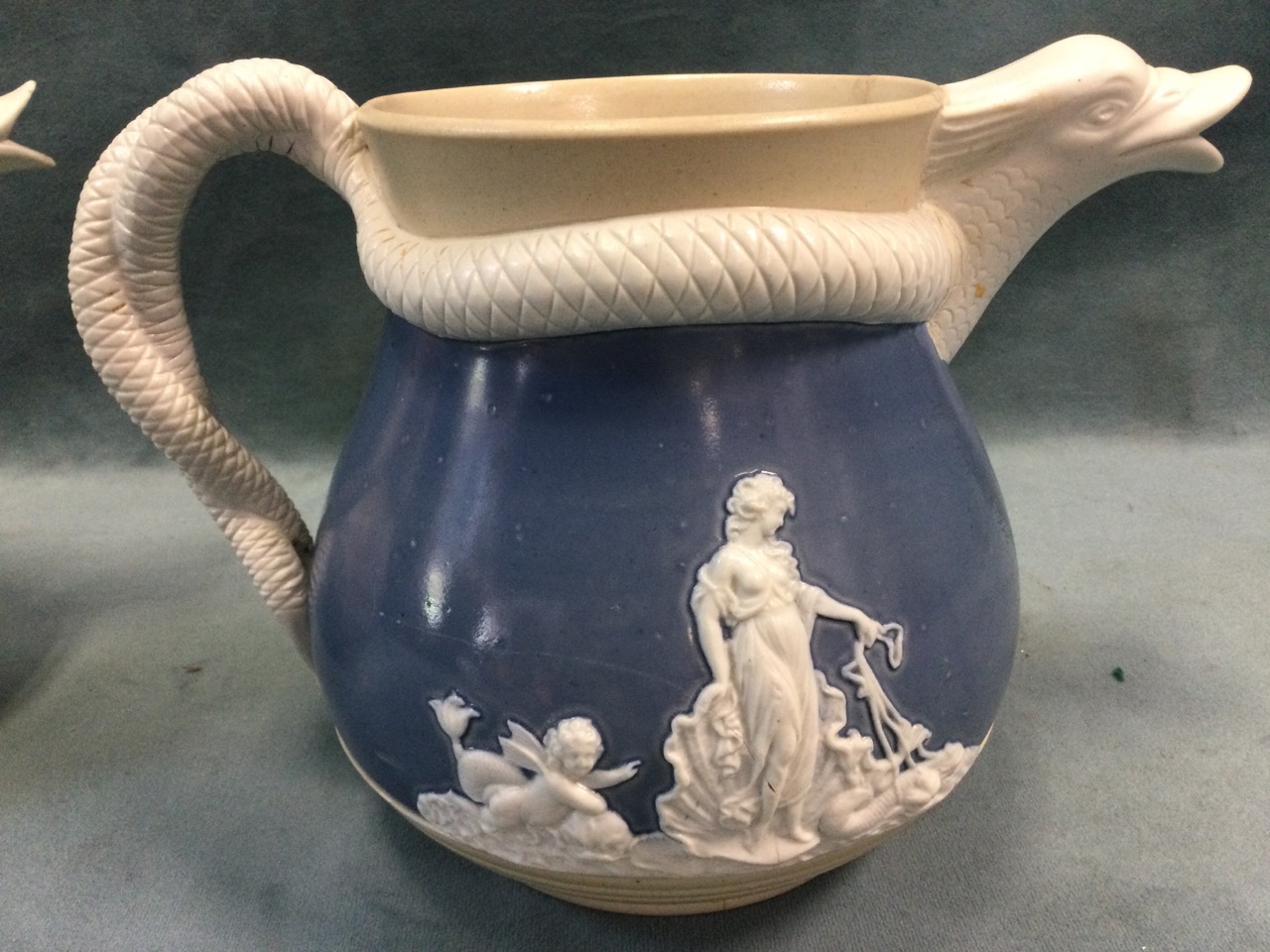 A Rockingham Brameld type jasperware jug with fish spout and serpent twisted handle, the bulbous - Bild 3 aus 3