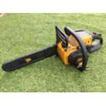 A JCB petrol chainsaw with 16in blade - model CS38.