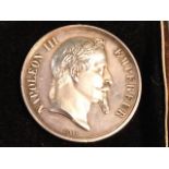 A cased Napoleon III 1867 silver life saving medal awarded to Englishman Edward Herbert in 1867 (1.