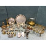 A hammered pewter three-piece teaset on tray; and a quantity of brass including kettle stands, a