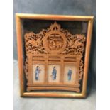 A nineteenth century cased carved sandelwood architectural style panel having fretwork pierced crest