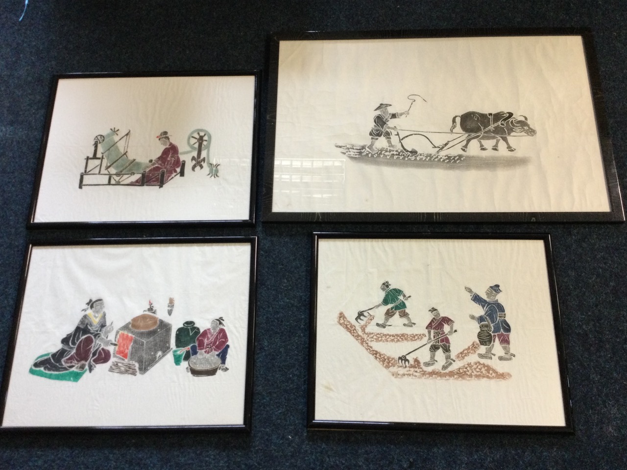 Chinese school, four traditional print rubbings on paper - monochrome of ploughing oxen, and three