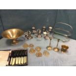 Miscellaneous metalware including a set of three silver plated candelabra, each with two ribbed