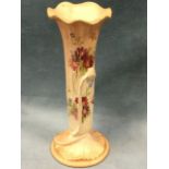 A Royal Worcester blush ivory vase of fluted form with waved rim, the body embossed with bud stem