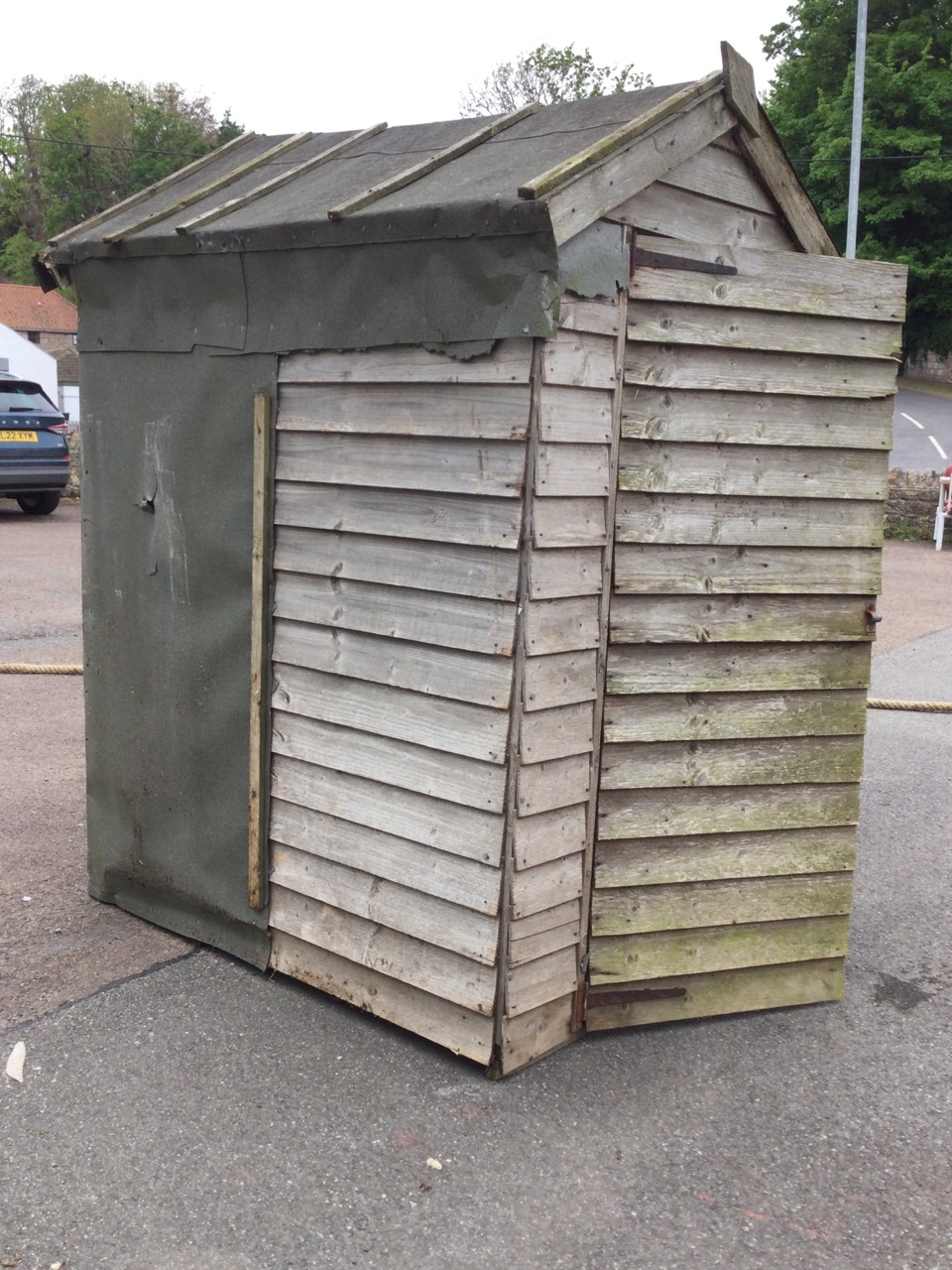 A lap-boarded garden shed with pitched felt roof, having hinged door - A/F. (45.5in x 58in x 80in) - Image 2 of 3