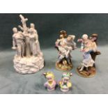 A European nineteenth century blanc-de-chine porcelain group modelled as two couples around a