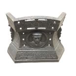 A Victorian cast iron fire tidy commemorating Livingstone, with circular medallion bust portrait