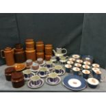 A collection of nine Hornsea storage jars with wood lids, and other Hornsea pottery - a coffeepot, a