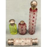 A Victorian twin-ended hobnail cut glass scent bottle with hallmarked silver cappings; a graduated