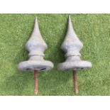 A pair of pointed finials with circular moulded bases, fitted with screw bolts. (16in) (2)