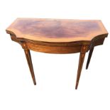 A Georgian boxwood strung bowfronted mahogany tea table with shaped corners to rectangular satinwood