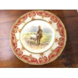 A Royal Doulton cabinet plate painted with a shepherd by N Johnson, the signed polychrome painting