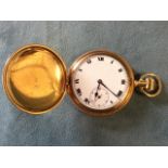 A gold plated American hunter pocket watch with engine turned decoration to case, the enamelled dial