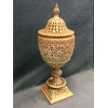 A large Royal Worcester reticulated urn & cover, the vessel with pierced foliate scrolled frieze