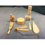 A collection of antique carved bone & ivory - floral trinket pot & cover, figure with bird, elephant