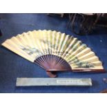 Chinese school, a large boxed fan painted with landscape scene, with birds, waterfall, boats and