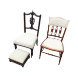 An Edwardian mahogany boxwood strung bedroom chair with satinwood inlay to oval pierced splats,